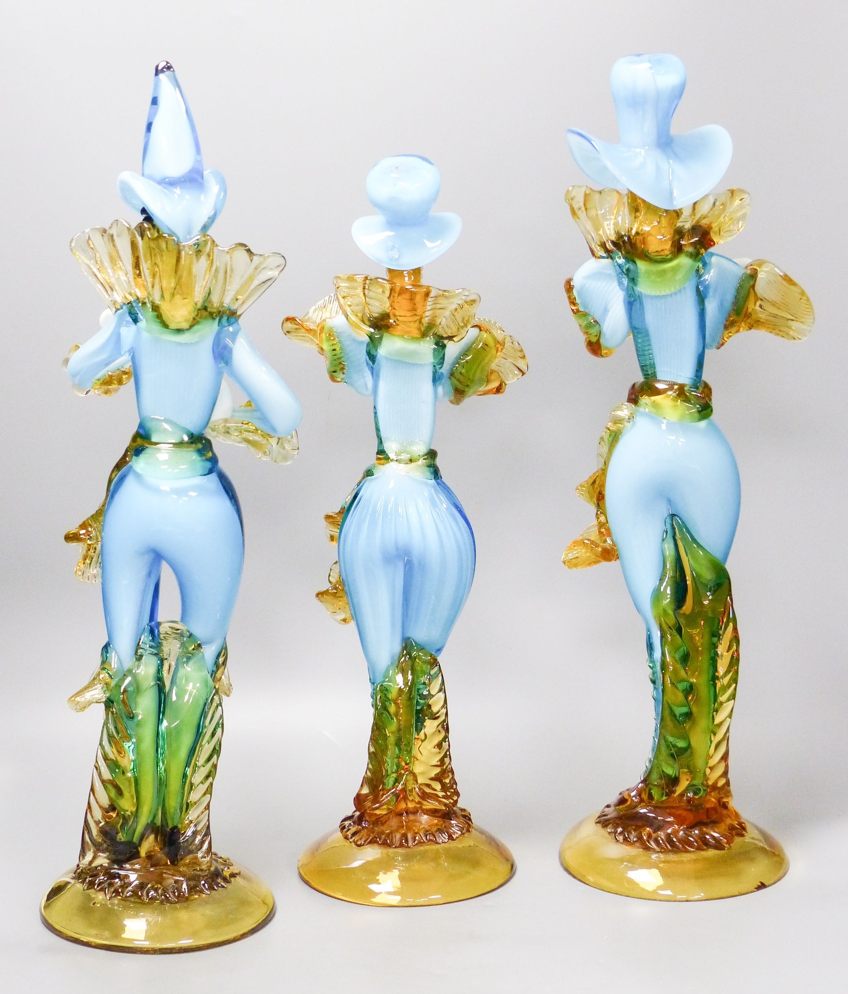 Three large Murano blue and Amber Glass figures, largest 47 cm